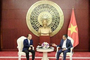 越南驻中国大使范青平会见广西壮族自治区人民政府副主席廖品琥。（图：越通社）