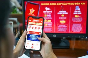 市公安厅鼓励企业优先使用电子身份应用程序VNeID进行在线注册。（图：光定）