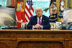 5月20日，美国总统特朗普在白宫椭圆形办公室宣布“金穹”导弹防御系统发展规划，并说加拿大希望参与其中。（图：AFP）