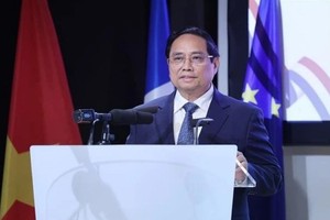 越南政府总理范明政出席越法企业论坛。（图：越通社）