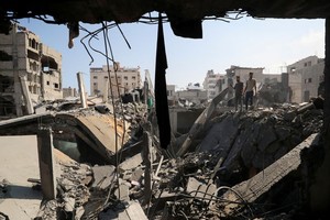 在加沙城，大量建筑物在袭击中受损。（图：路透社）