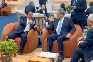 越南政府总理范明政会见中国国务院总理李强。（图：互联网）