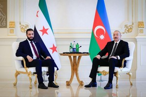 阿塞拜疆总统阿利耶夫（右）与叙利亚政权领导人艾哈迈德‧沙拉。（图：互联网）