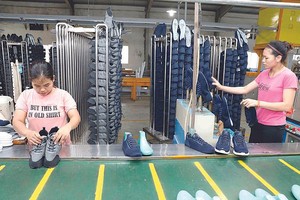 皮鞋行业有赖EVFTA协定而保持输往欧盟市场的出口量。（图：越通社）