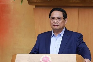 范明政总理主持政府关于越南国际金融中心专题会议。（图：越通社）