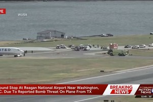 “诈弹”威胁致华盛顿里根机场一度停飞。（视频截图）