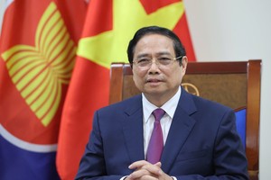 越南政府总理范明政发表视频讲话。