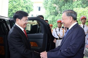 党中央总书记苏林会见老挝人民革命党中央总书记、国家主席通伦•西苏里。图自越通社