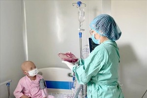 患儿身体状况基本稳定。图自越通社