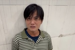  嫌犯陈明新在公安机关。