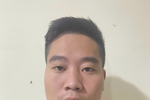 图: 刘德卿在公安机关。