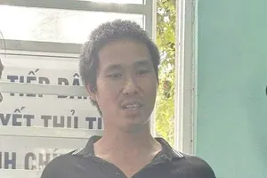 黎士松被捕时的照片。