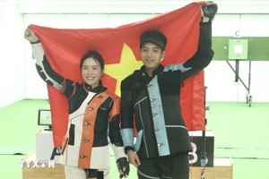 越南射击选手黎氏梦泉与阮心光。图：越通社