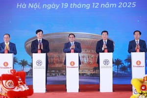 政府总理范明政出席234个重点项目和工程的开工、竣工及通车仪式。图：越通社