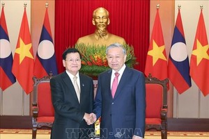 党中央总书记苏林会见老挝总书记、国家主席通伦·西苏里。