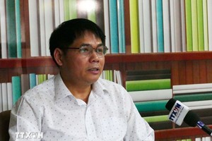 在老越南企业协会副主席黄文军。 