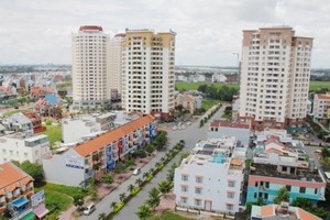 HoREA has proposed to change some articles of the Land Law 2013 to solve congestions for the real estate market (Photo: SGGP)