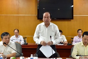  Minister Mai Tien Dung states at the working session (Photo: VGP)