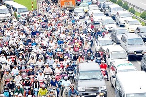 Vietnam now has 49 million motorbikes and 3.2 million automobiles (Photo: SGGP)