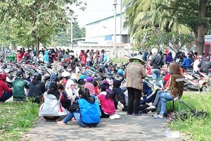 Dong Nai province advances an extra of VND1.4 billion to pay social premium for workers of Texwell Vina company whose owner has run away