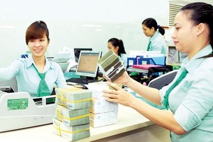 Overseas remittances is forecast to reach US$15.9 billion this year (Photo: SGGP)