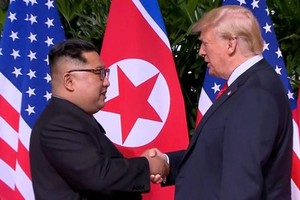DPRK Chairman Kim Jong-un and US President Donald Trump at the first DPRK-USA summit in Singapore in June 2018 (Source: CNN)