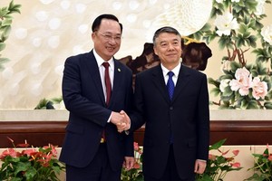 Deputy Minister of Public Security Nguyen Van Thanh (L) and his Chinese counterpart Liu Zhao (Photo: VNA)
