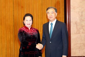 National Assembly Chairwoman Nguyen Thi Kim Ngan (L) meets with Chairman of the Chinese People’s Political Consultative Conference Wang Yang in Beijing on July 12 (Photo: VNA)