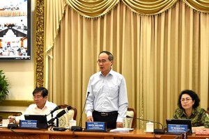 HCMC Party Leader Nguyen Thien Nhan makes a statement at the conference on administrative reform on July 18 (Photo: SGGP)