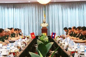 At the Vietnam-Laos defence policy exchange (Photo: VNA)