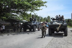 Philippine security forces patrol in Maguindanao, Mindanao island. (Photo: AFP/VNA)