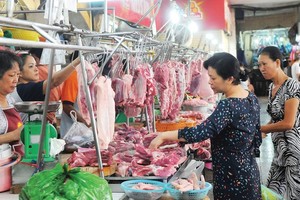 Consumers’ pork demand is still high despite price hike trend (Photo: SGGP)