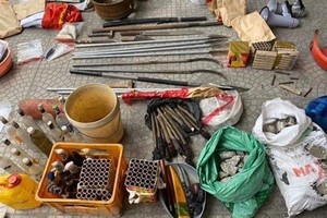 Weapons seized in the incident (Photo: VNA)