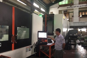 Many businesses in HCMC have been making effort to maintain production and increase market share (Photo: SGGP)