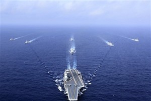 China's Liaoning aircraft carrier sailing during a drill in the South China Sea in 2018. (AFP/VNA Photo)