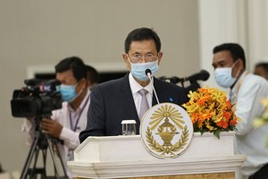 Senior Minister Var Kimhong speaks at the ceremony at Peace Palace. Photo: Khmer Times