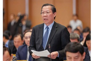 Chairman of the Ho Chi Minh City People’s Committee Phan Van Mai speaks at the conference. (Photo: SGGP)