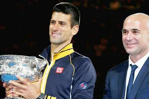 Andre Agassi (phải) sẽ làm việc với Novak Djokovic từ sau Rome Masters.