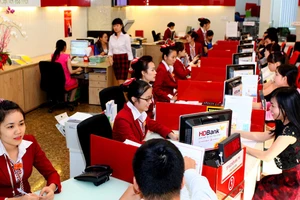 HDBank đủ tiêu chuẩn lên sàn nhưng lãnh đạo ngân hàng đang cân nhắc thời điểm thích hợp để niêm yết. Ảnh