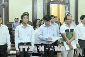 Xét xử vụ án gây hậu quả nghiêm trọng tại Navibank. Ảnh: TTXVN