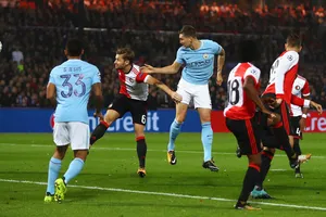 John Stones đánh đầu ghi bàn mở tỷ số cho Man.City. Ảnh: Getty Images 