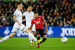 Jesse Lingard (phải) tỏa sáng với cú đúp để chờ đợi cơ hội tiếp theo ở Premier League. Ảnh: Getty Images 