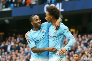 Leroy Sane (phải) và Raheem Sterling đang thật sự tỏa sáng mùa này. Ảnh: Getty Images