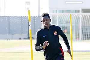 Dembele chưa thể hoàn thành 100% buổi tập cùng Barca. Ảnh: Getty Images.