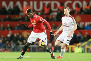 Paul Pogba (trái) và Man.United đã có ngày Boxing Day thất vọng. Ảnh: Getty Images 