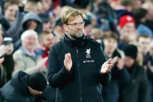 HLV Jurgen Klopp giờ đã kiệm lời hơn khi đã “hòa nhập” với Premier League. Ảnh: Getty Images 