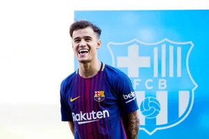 Coutinho thần tượng Ronaldinho. Ảnh: Getty Images