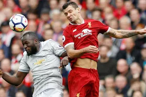 Dejan Lovren (phải) tin Liverpool có thể khuất phục bất kỳ hệ thống phòng ngự nào của Man.United. Ảnh: Getty Images