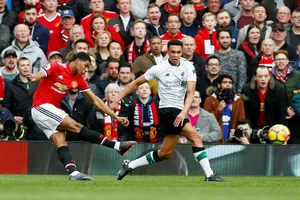 Marcus Rashford tung cú sút mở tỷ số. Ảnh: Getty Images 