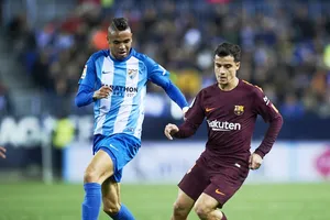 Coutinho (phải) ghi bàn giúp Barca chiến thắng trong ngày vắng Messi. Ảnh: Getty Images.